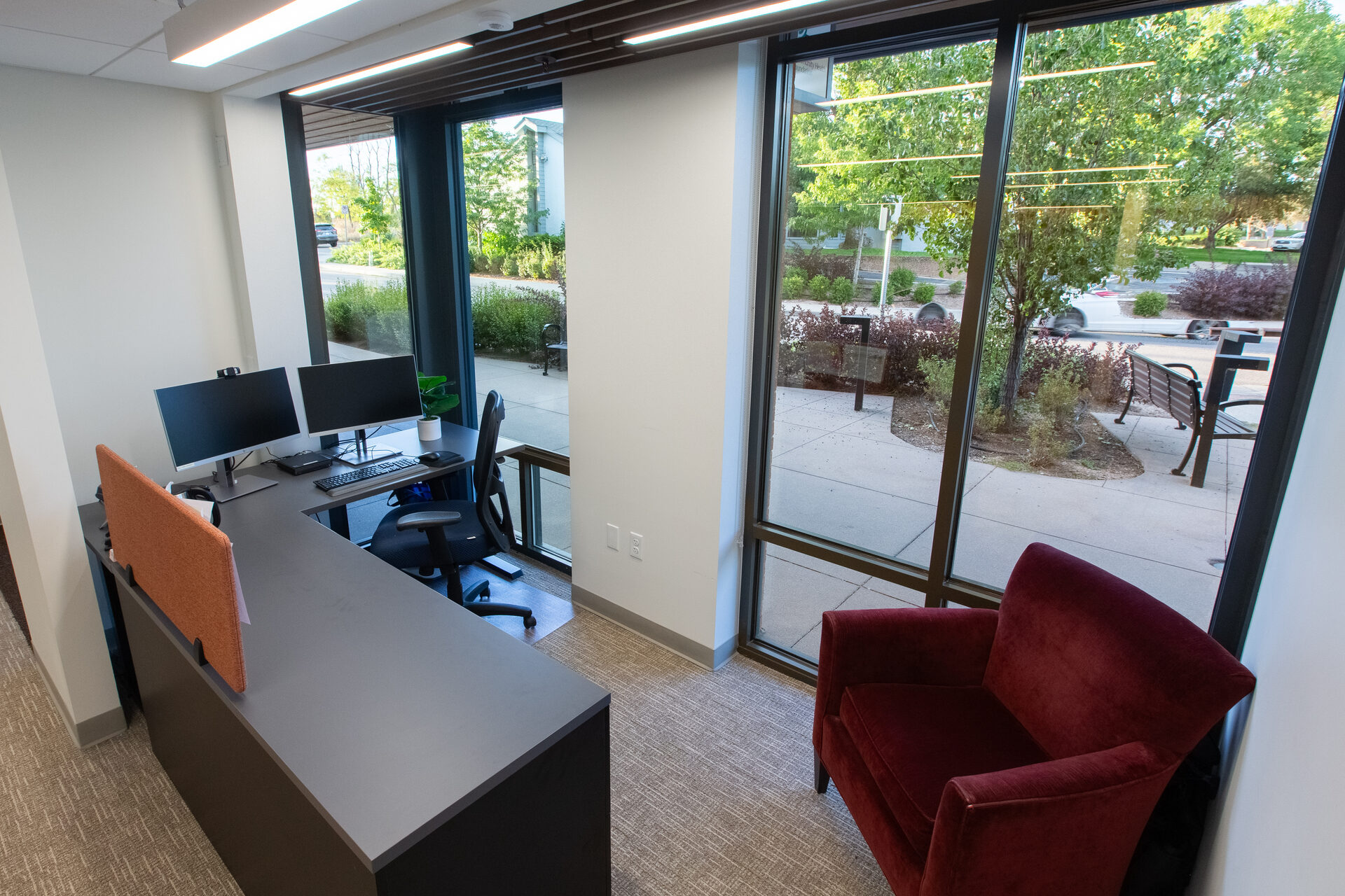 Window-side workstation with street-level views